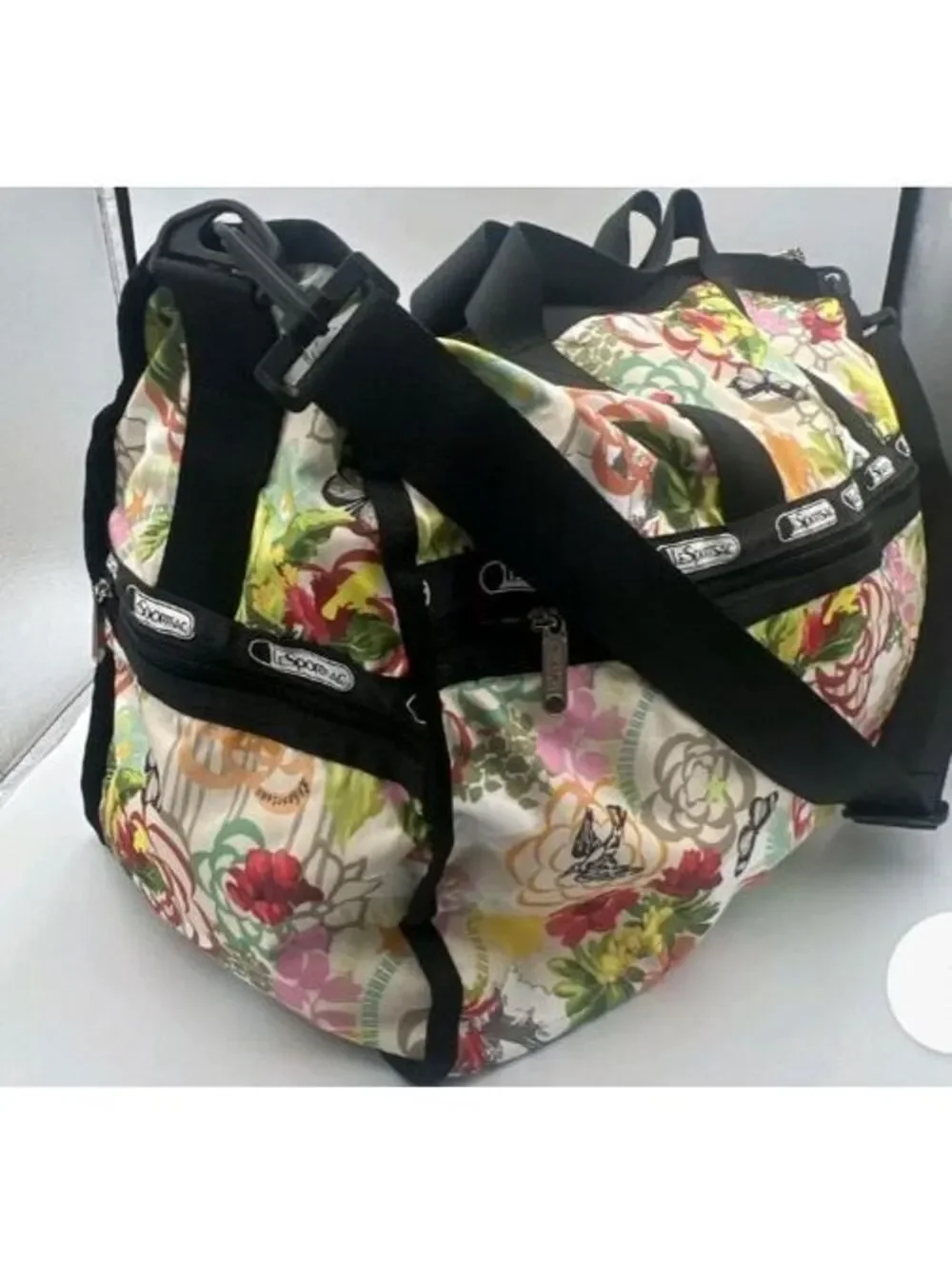 LeSportsac Large Floral Print Duffel Bag with Black Straps and Multiple Zippers